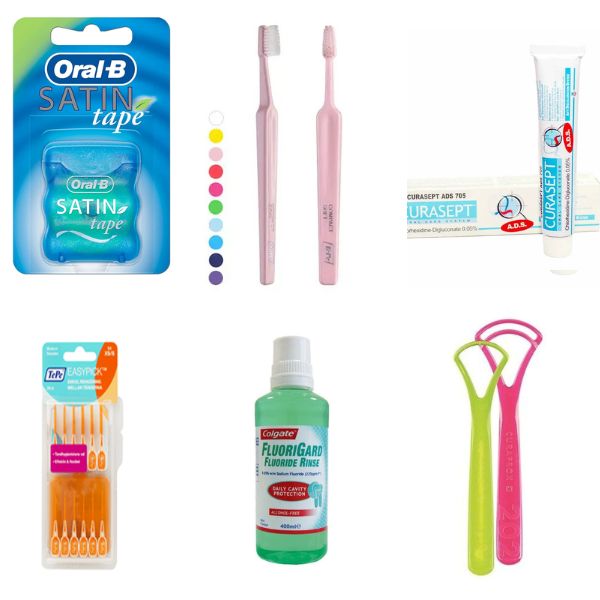 Collection of 6 different products including floss, toothpaste, a toothbrush, toothpicks, mouthwash and tongue cleaners