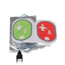Cardiac defibrillator pads with green and red symbols on a white background
