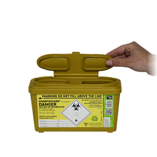 Yellow hazardous waste container with a hand opening it on a white background