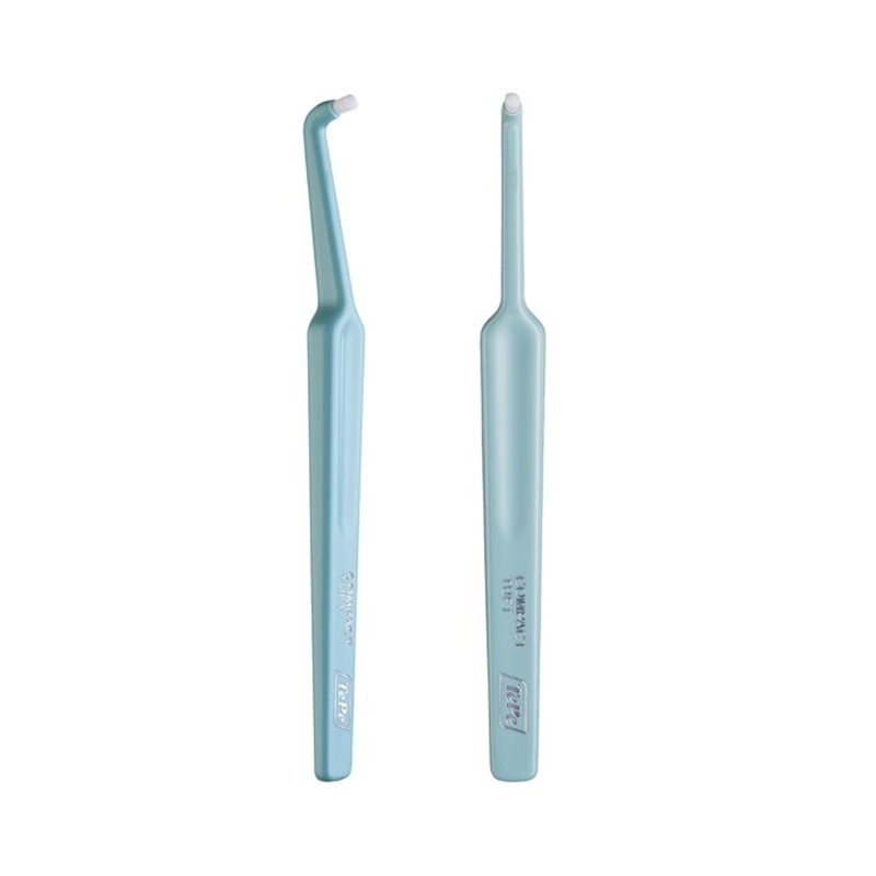 Tepe compact tuft head toothbrush