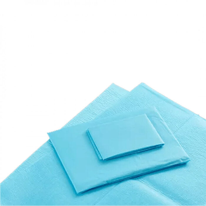 Set of blue non-fenestrated sterile drapes on a white background